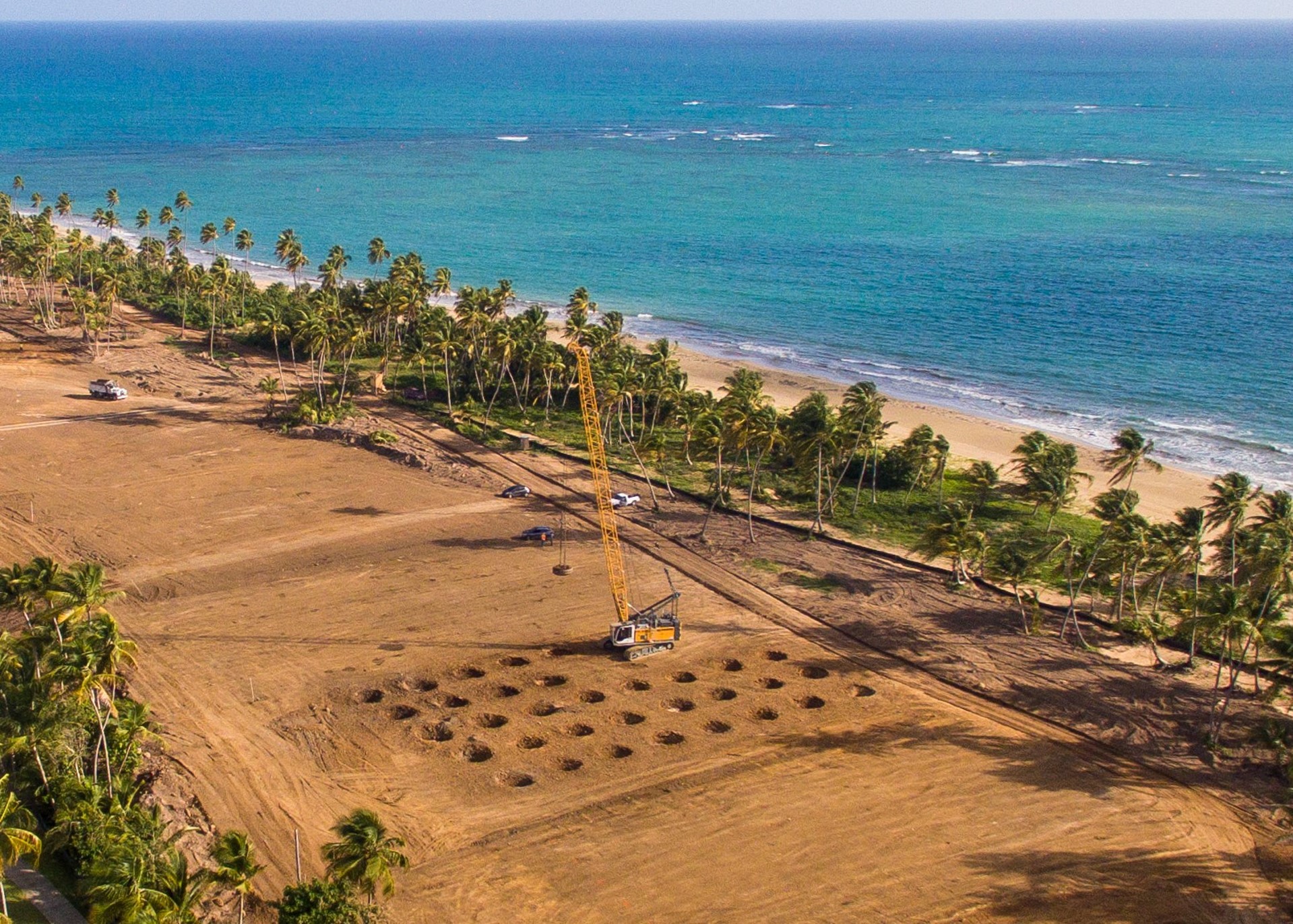 Aerial view of dynamic compaction work on liquefiable soils in Puerto Rico. (Courtesy of Densification, Inc.)