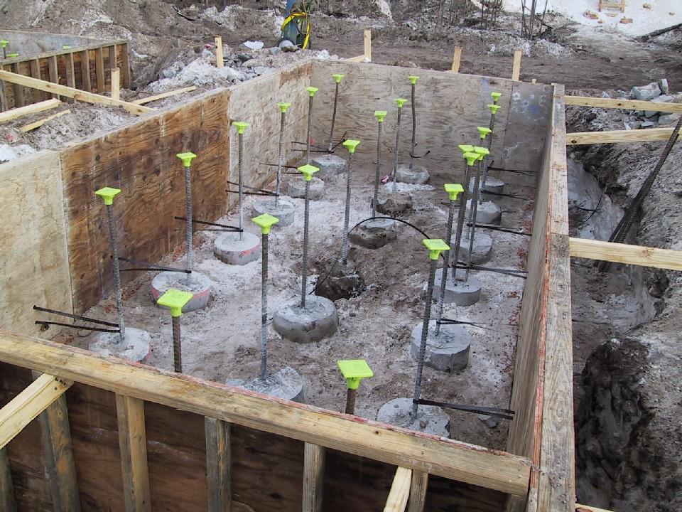 Group of CFA piles with form for pile cap. From Brown et al. (2007). Group of CFA piles with form for pile cap. From Brown et al. (2007).