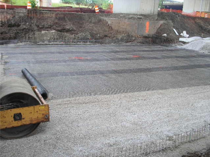 Geosynthetic placement for CSE. (Courtesy of Jim Collin). Geosynthetic placement for CSE. (Courtesy of Jim Collin).