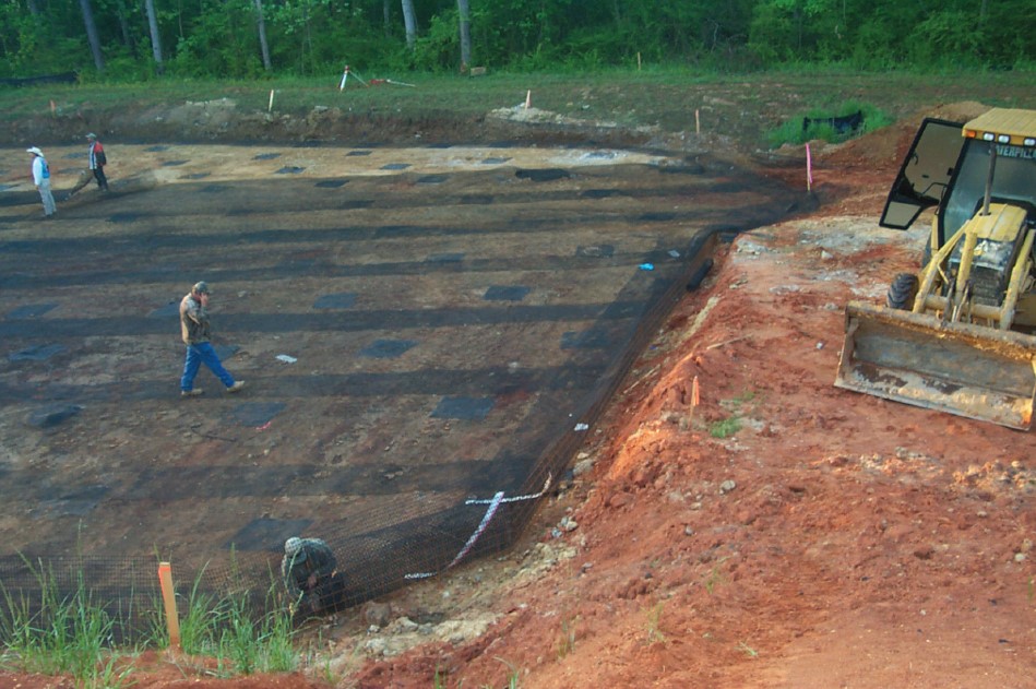 Base layer of geosynthetic reinforcement for a CSE. (Courtesy of Jim Collin). Base layer of geosynthetic reinforcement for a CSE. (Courtesy of Jim Collin).