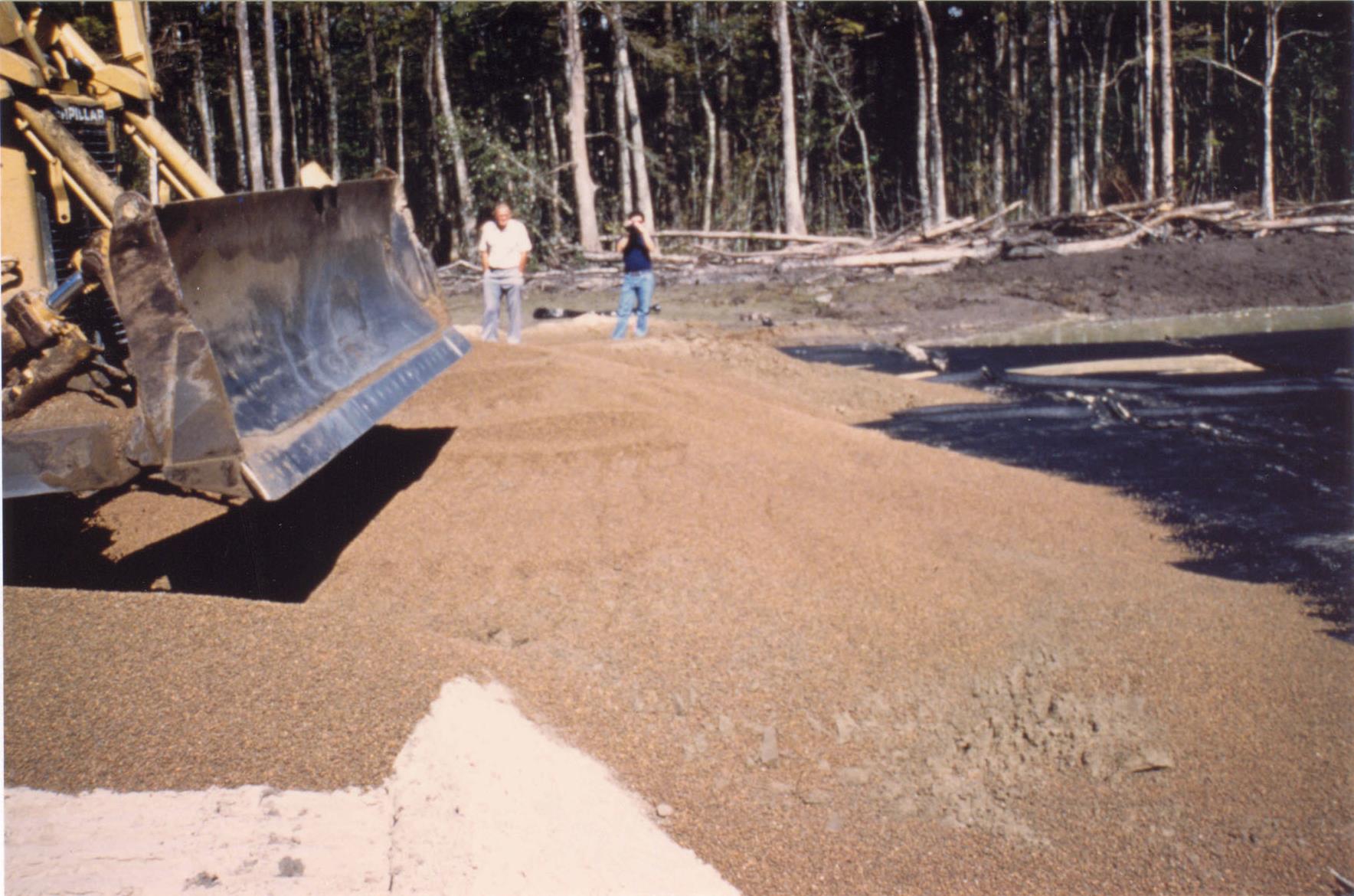 Placement of ESCS lightweight fill. Courtesy of FHWA. Placement of ESCS lightweight fill. Courtesy of FHWA.