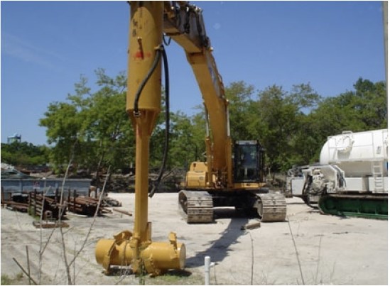 Excavator-mounted mixing tool used for mass stabilization. From Garbin et al. (2011). Excavator-mounted mixing tool used for mass stabilization. From Garbin et al. (2011).