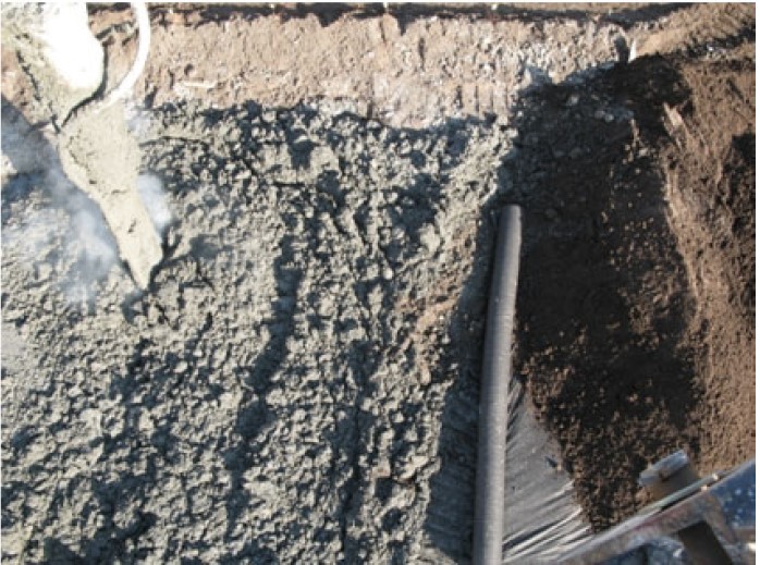 Geotextile and surcharge fill being placed as mass stabilization progresses. From Garbin et al. (2011). Geotextile and surcharge fill being placed as mass stabilization progresses. From Garbin et al. (2011).