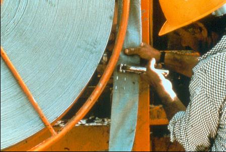 Stapling the PV Drain Splice. Courtesy of Geotechnics B.V.