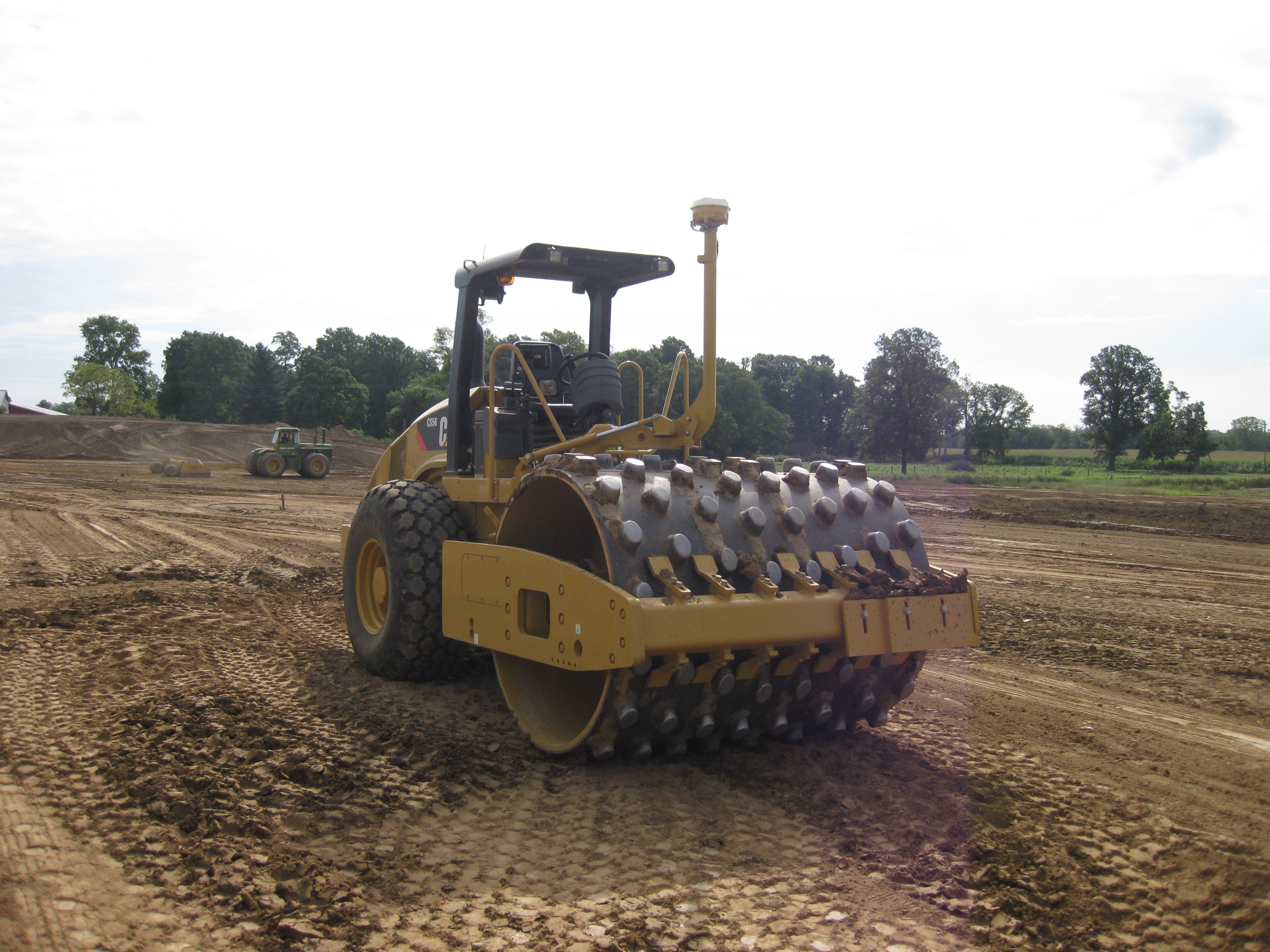 Example of a pad foot traditional compaction roller. Courtesy of David White, Iowa State University. Example of a pad foot traditional compaction roller. Courtesy of David White, Iowa State University.