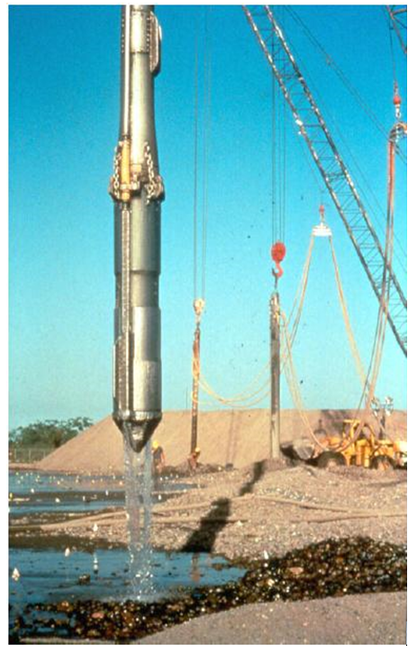 Photograph of a high-powered, probe-type vibrator used in vibrocompaction of soils.