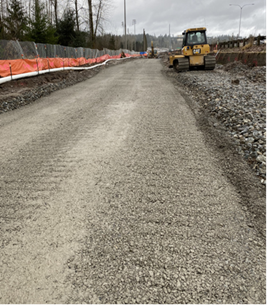 Complete section of stabilized aggregate with geogrid and separation fabric