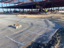 Photograph of layout of geogrid around obstructions.