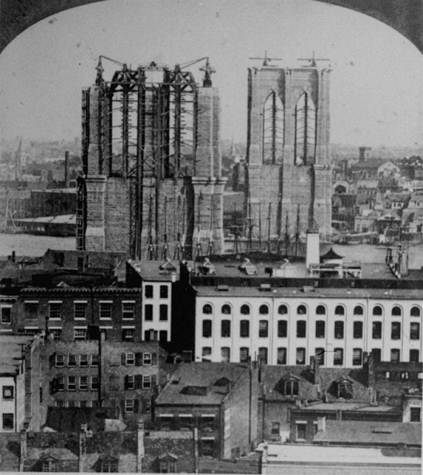 Black and white photograph of the Brooklyn Bridge towers